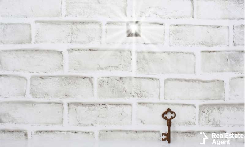 Keyhole brick wall bright light shinning