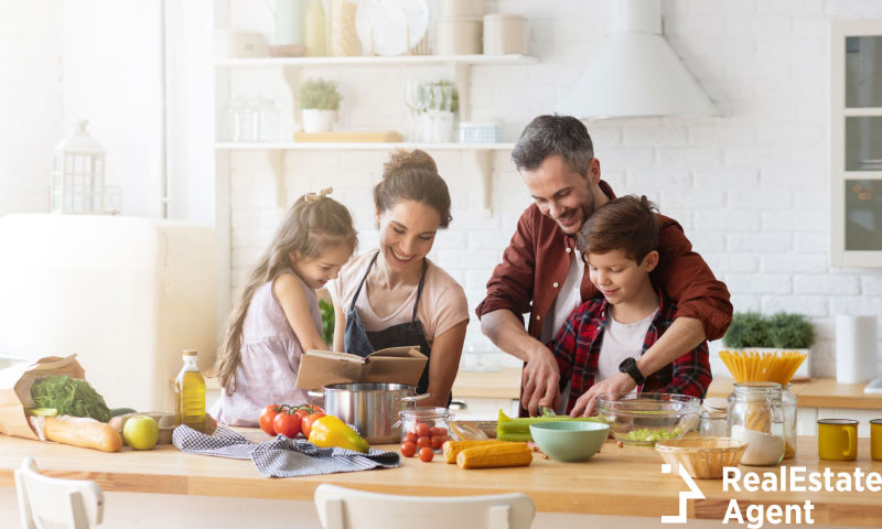 happy family cooking together on