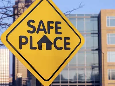 big orange sign with safe place