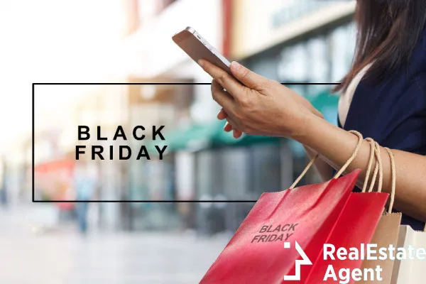 black friday woman using smartphone