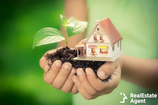 child holding house tree gands