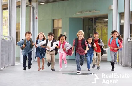 group of elementary school kids running