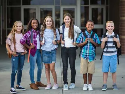 group of kids going to school