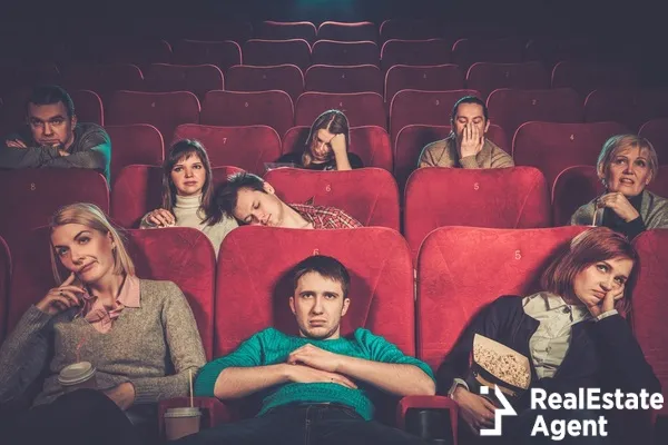 group of people watching boring movie