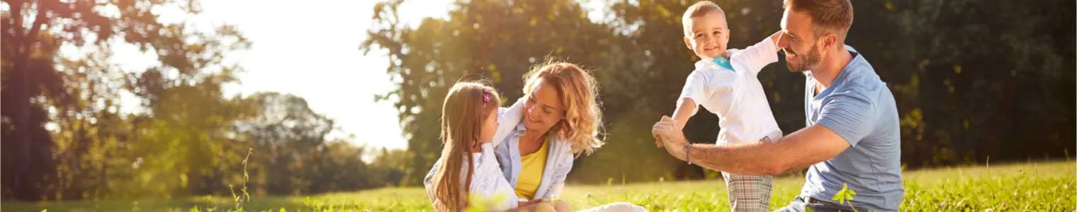 happy male female playing with kids