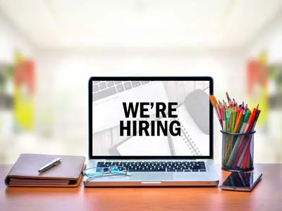 laptop with text we are hiring