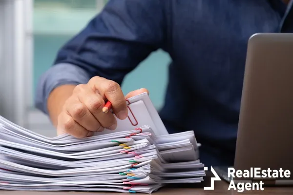 man picking documents