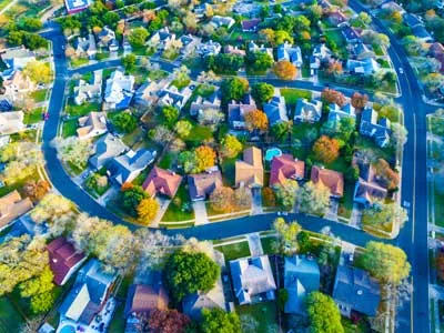 modern suburb aerial view during fall