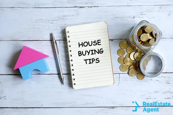 notebook written with house buying tips