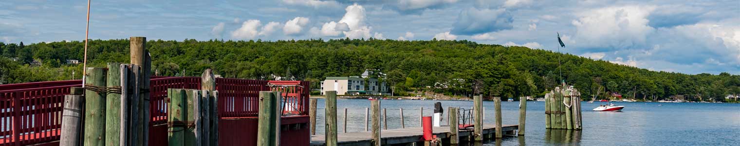 scenic nature view of Long Lake pier in Naples Maine