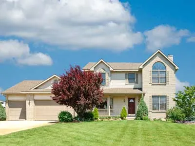 suburban home with a beautiful vynil siding in the suburbs of michigan state