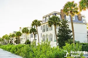 a side walk passes old world homes