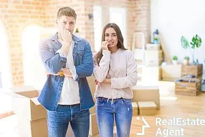 beautiful young couple moving house