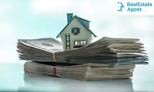 A house on top of a pile of money representing Down Payment