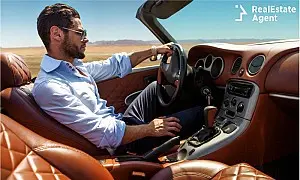 nice good looking man holding car