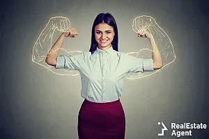 powerful confident woman flexing her muscles