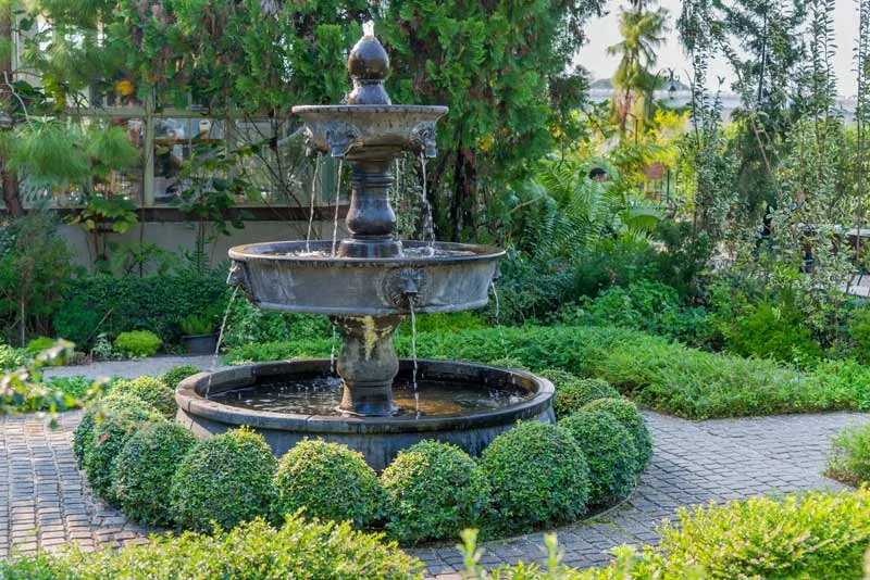 tiered outdoor fountain in a garden