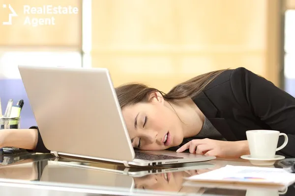 tired business woman sleeping over a laptop