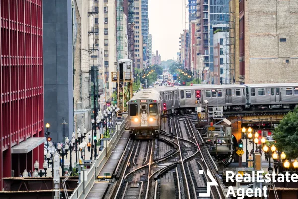 train on elevated tracks buildings