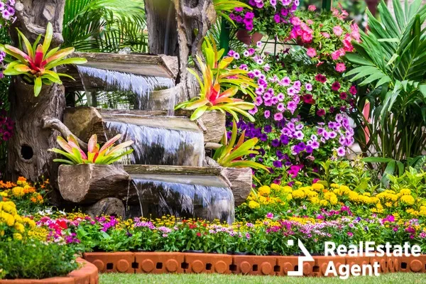 waterfall flow and vivid flowers