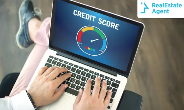 What is a credit score and how does it impact real estate