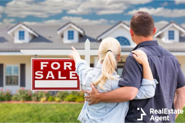 young adult couple facing pointing front